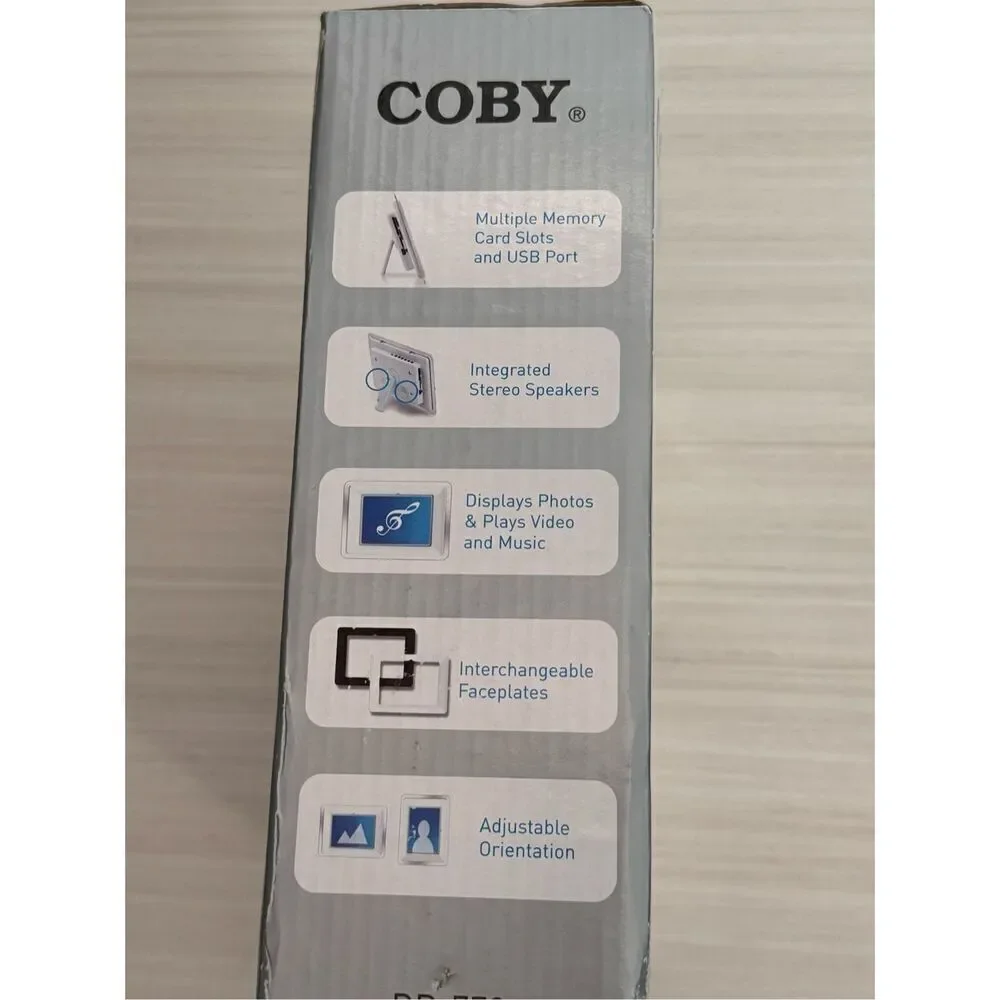 COBY 7 WIDESCREEN DIGITAL PHOTO FRAME with MP3 PLAYER